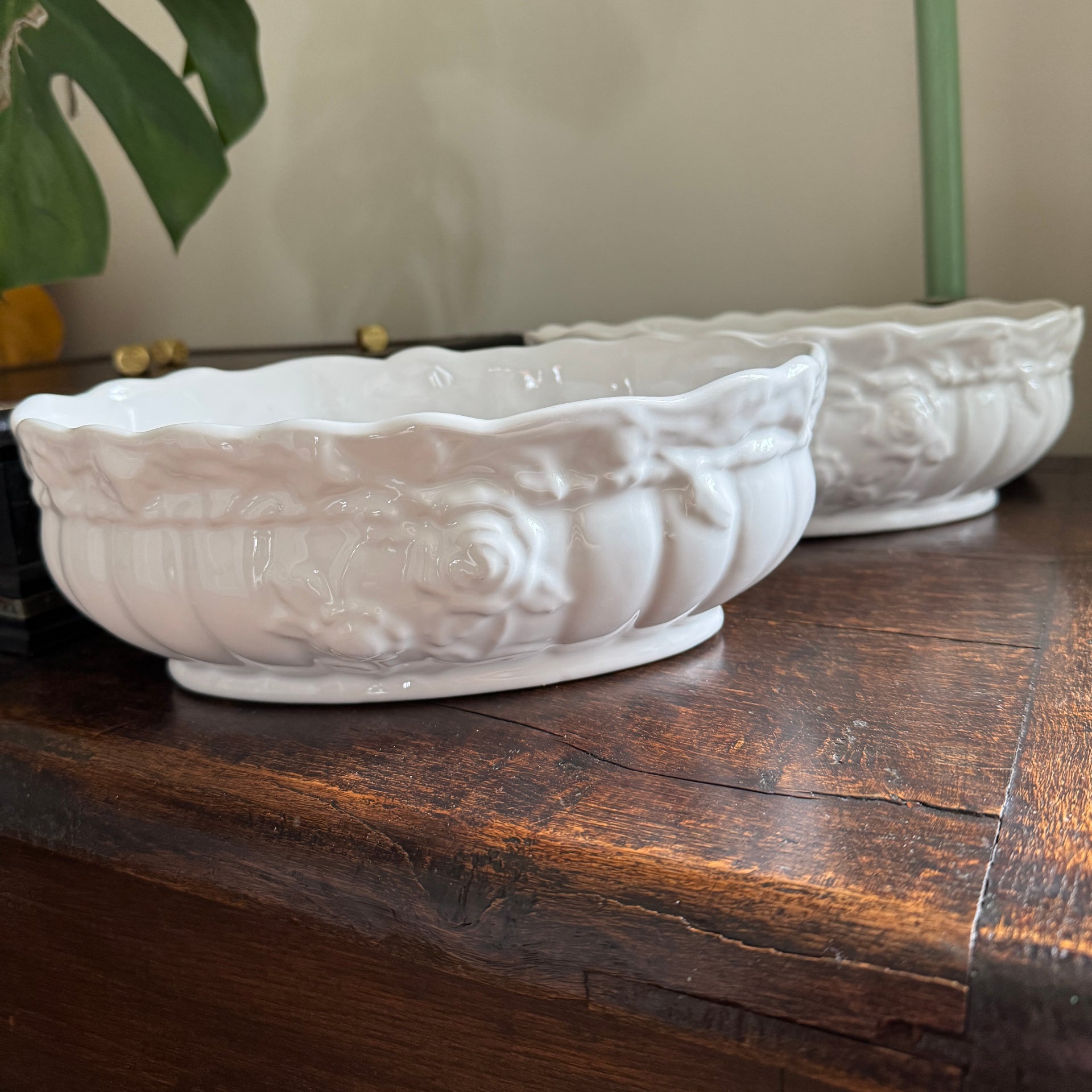 White plant pots styled in interior setting